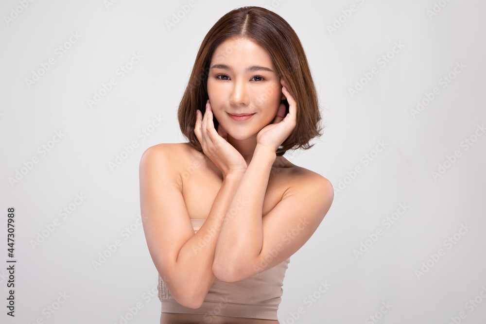 Beautiful Asian young woman touching soft cheek smile with clean and fresh skin Happiness and cheerful with positive emotional,isolated on white background,Beauty and Cosmetics Concept Beautiful Asian young woman touching soft cheek smile with clean and fresh skin Happiness and cheerful with positive emotional,isolated on white background,Beauty and Cosmetics Concept