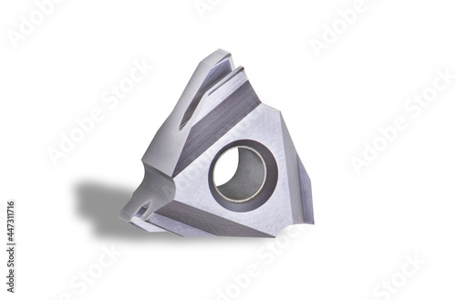 metalworking carbide insert triangle. special tool. Used auto turning machine. Material micro alloy coating. Isolated on white background.