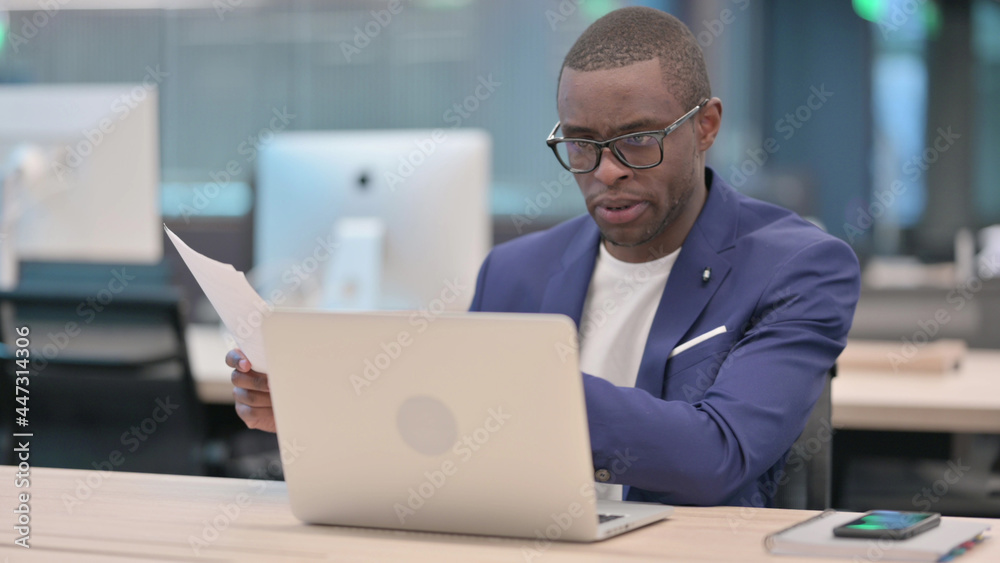 Young African Businessman Talking on Video Call on Laptop