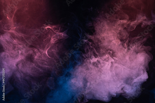 Blue and pink steam on a black background.