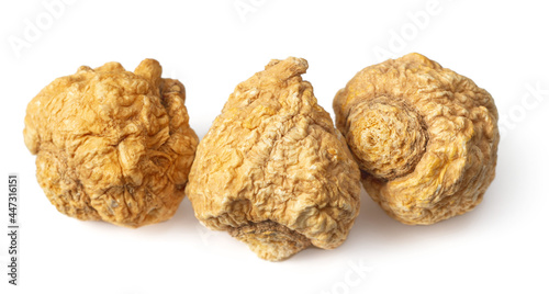 Dried maca roots isolated on whtie background photo