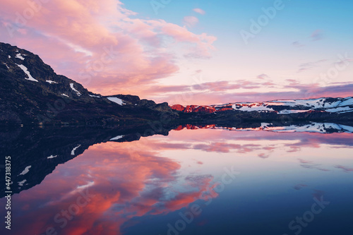 Lake near the Trolltunga in Norway during sunet photo