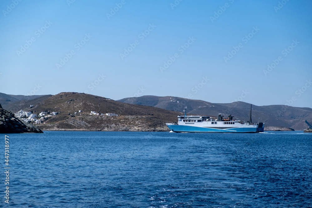Ferryboat in blue Aegean sea and sky background. Greek island. Greece