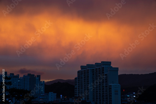 sunset with reddish clouds © PILYONG
