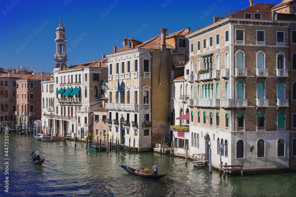 facades of the narrow streets of the old city of Venice