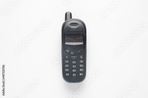 A picture of old obsolete smartphone on white background. Famous design in year 2000.