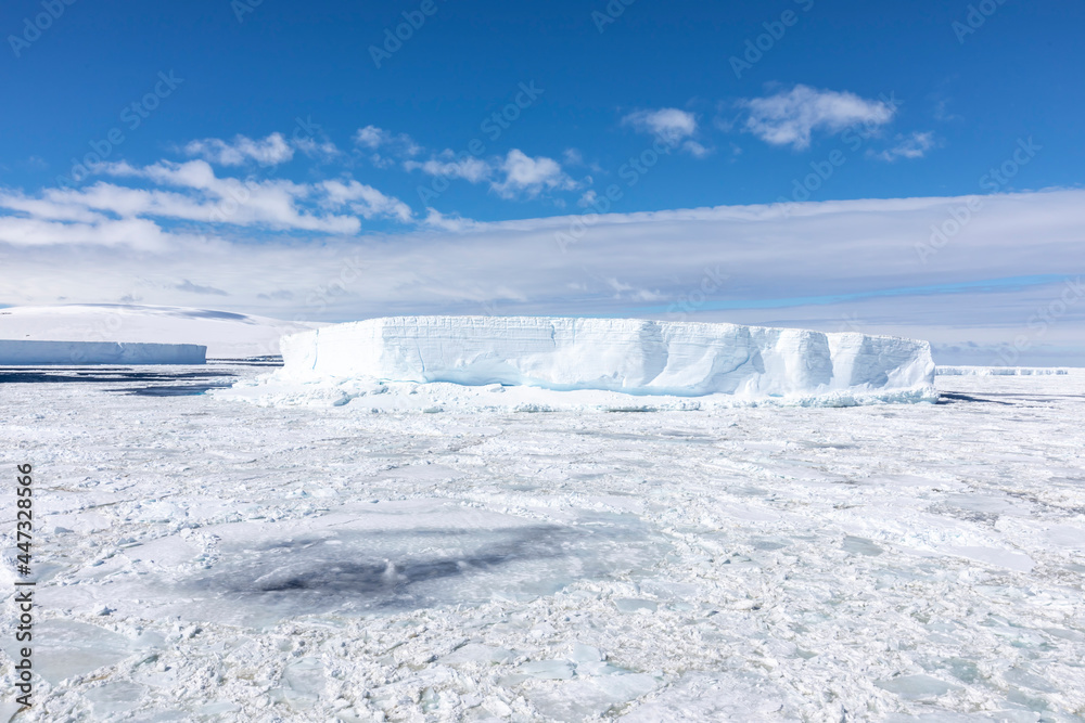 Iceberg amongst winter sea ice breaking up in the Weddell Sea Iceberg amongst winter sea ice breaking up in the Weddell Sea