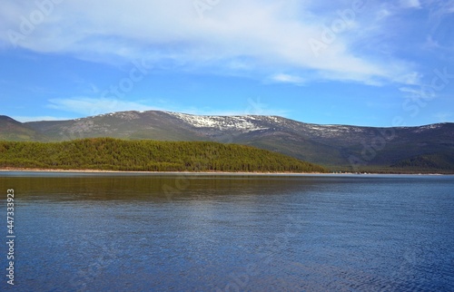 Mountainous coast of Lake Baikal in early summer