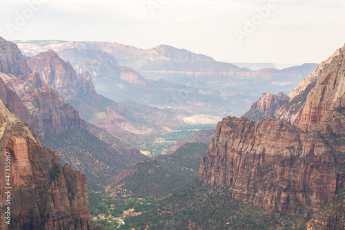 Looking through the canyon with views of Angels Landing and the Zion Scenic Drive from the Observation Point. Zion National Park, Springdale, Utah.