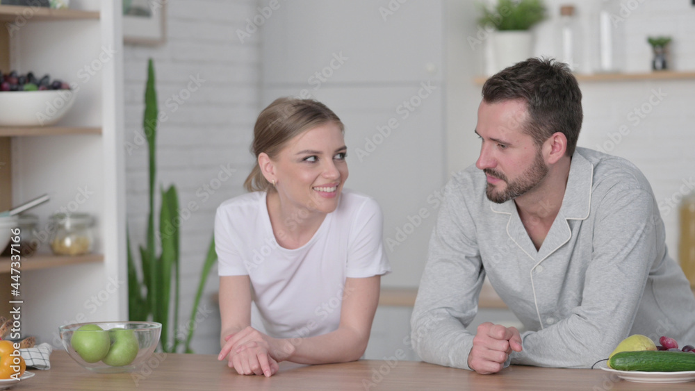 Fototapeta premium Close up of Couple having Conversation while in Kitchen