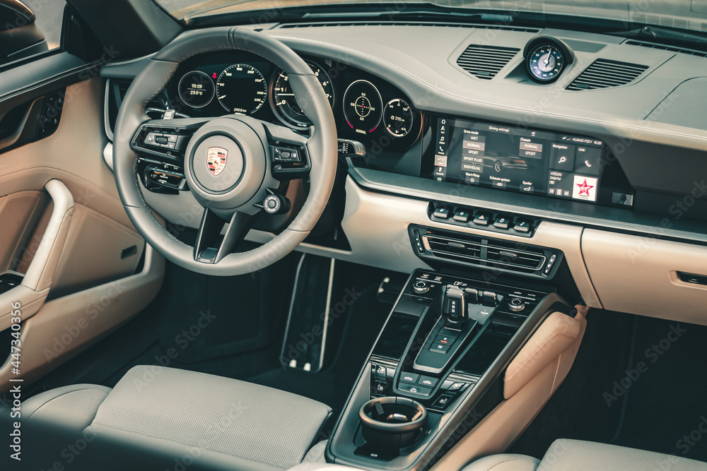 Porsche 992 Carerra 4s Cabriolet 911 interior cockpit view, steering wheel  and details shot Stock Photo | Adobe Stock