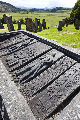 Sixteenth century grave slabs in the Poltalloch burial enclosure in the churchyard at the historic town of Kilmartin in Kilmartin Glen, Argyll & Bute, Scotland UK photo