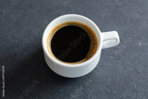 Steaming coffee espresso in cup