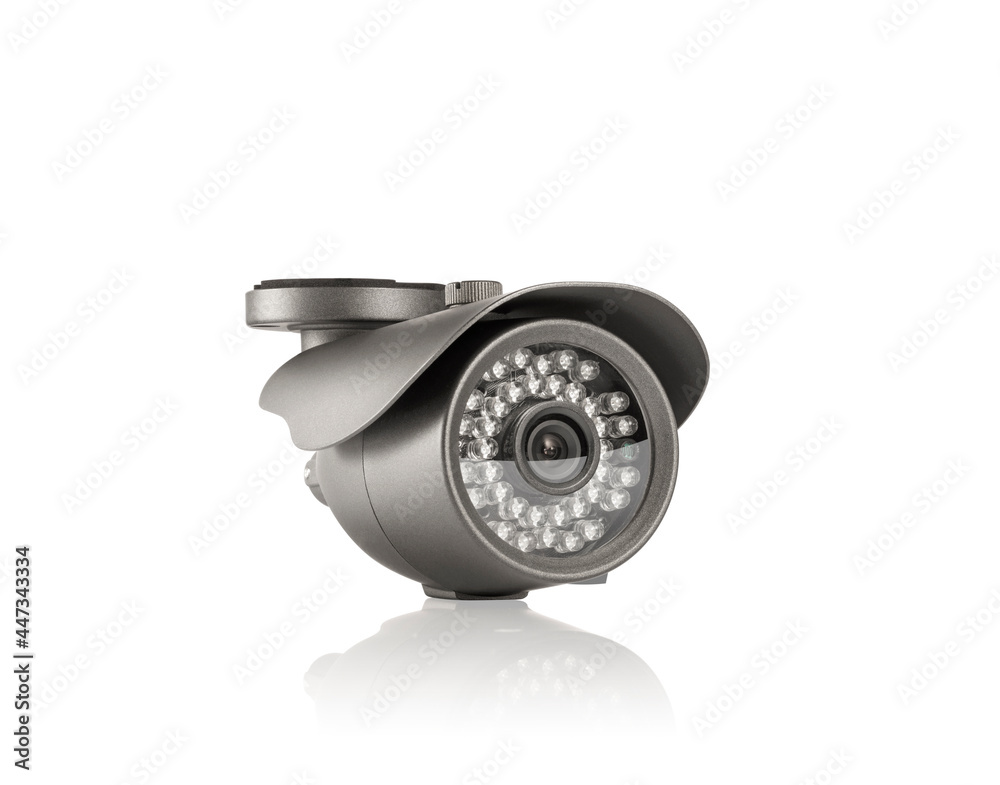 Three-quarter view of round carbon outdoor surveilance camera with led lights on white background with reflection underneath Three-quarter view of round carbon outdoor surveilance camera with led lights on white background with reflection underneath
