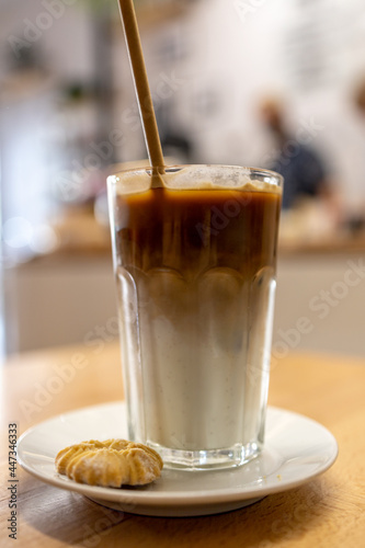 frappe with straw in cafe 