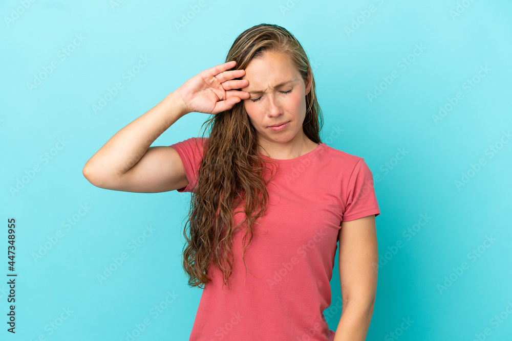 Young caucasian woman isolated on blue background with tired and sick expression Young caucasian woman isolated on blue background with tired and sick expression