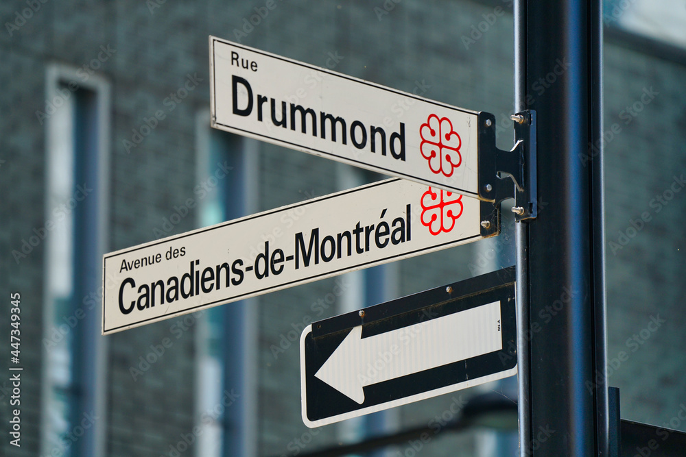 Intersection of Drummond and CanadiensdeMontreal street in downtown