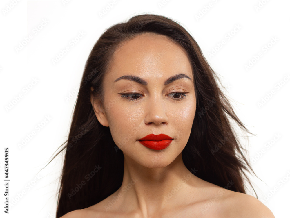 Closeup portrait of a woman with developing straight hair. Sweet tender young girl, brunette. Red lipstick on the lips, clean skin. Beauty, spa, injections, cosmetology, beautiful Closeup portrait of a woman with developing straight hair. Sweet tender young girl, brunette. Red lipstick on the lips, clean skin. Beauty, spa, injections, cosmetology, beautiful