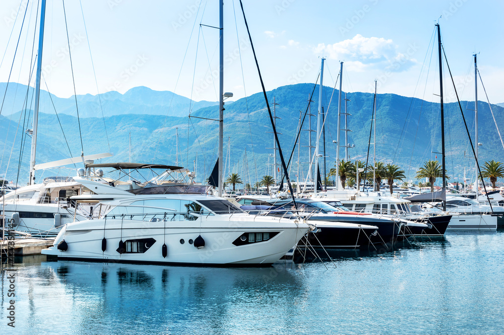 Yachts at the seaport against mountains. Yachts at the seaport against mountains.