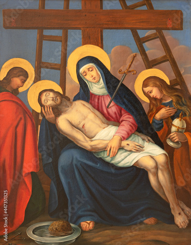 VIENNA, AUSTIRA - JUNI 17, 2021: The painting  Deposition of the cross (Pieta) as part of Cross way stations in church Rochuskirche by unknown artist. photo