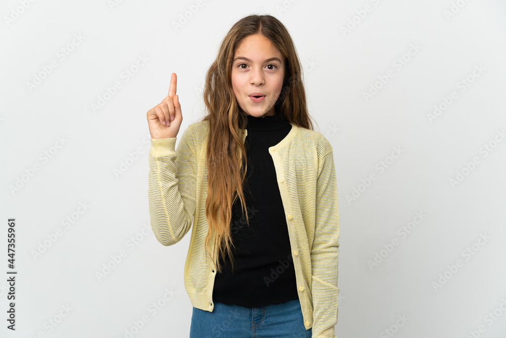 Little girl over isolated white background intending to realizes the solution while lifting a finger up