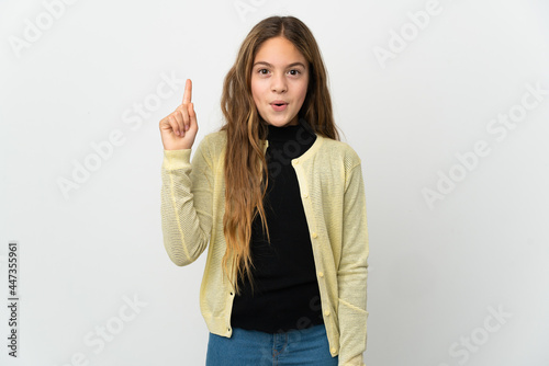Little girl over isolated white background intending to realizes the solution while lifting a finger up