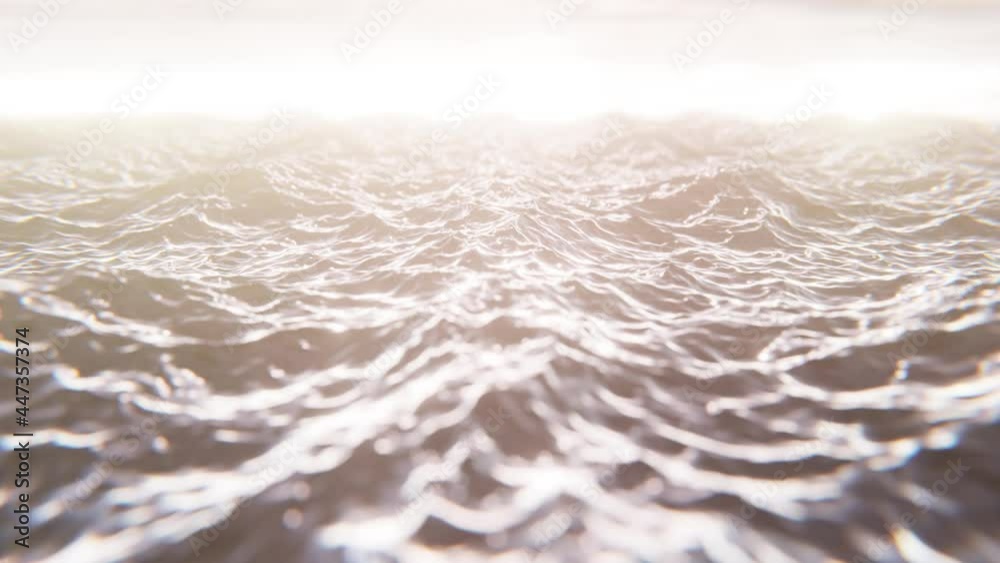 Realistic looping 60 fps 3D animation of the sunny and shiny waving stormy ocean waters at sunset rendered in UHD Realistic looping 60 fps 3D animation of the sunny and shiny waving stormy ocean waters at sunset rendered in UHD