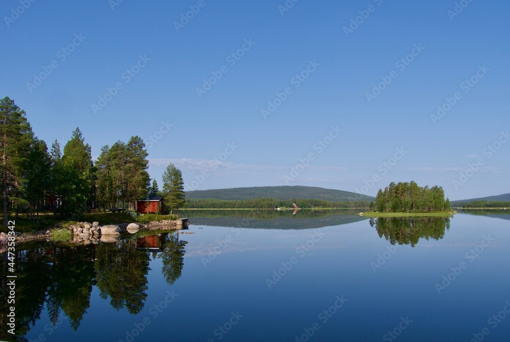  Lake view with reflex in the North of Sweden