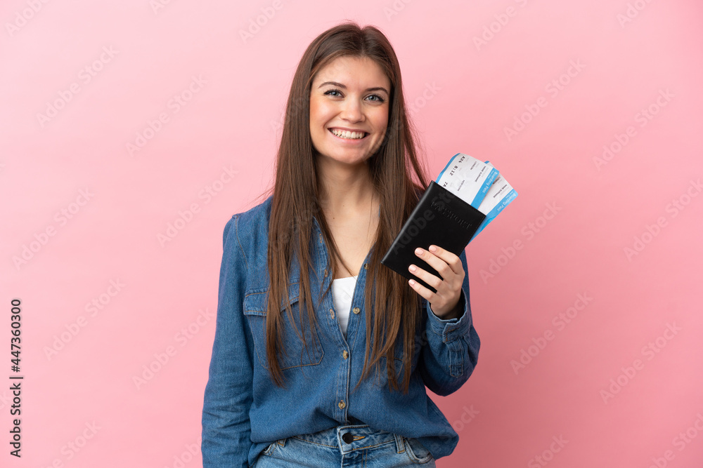 Young caucasian woman isolated on pink background happy in vacation with passport and plane tickets Young caucasian woman isolated on pink background happy in vacation with passport and plane tickets