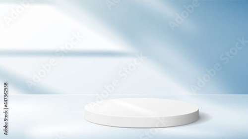 Abstract blue background with white pedestal for product demonstration.