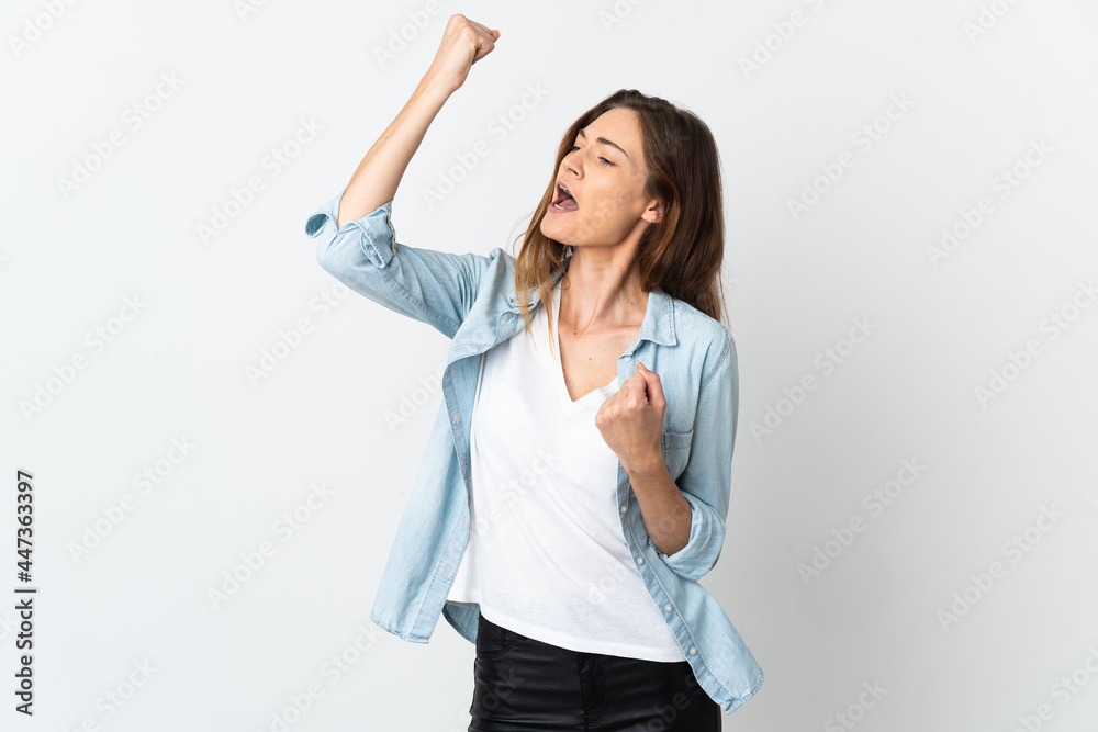 Young Ireland woman isolated on white background celebrating a victory Young Ireland woman isolated on white background celebrating a victory