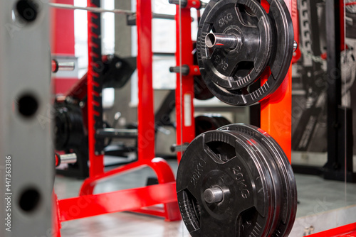 Barbell sports equipment in the gym, close-up