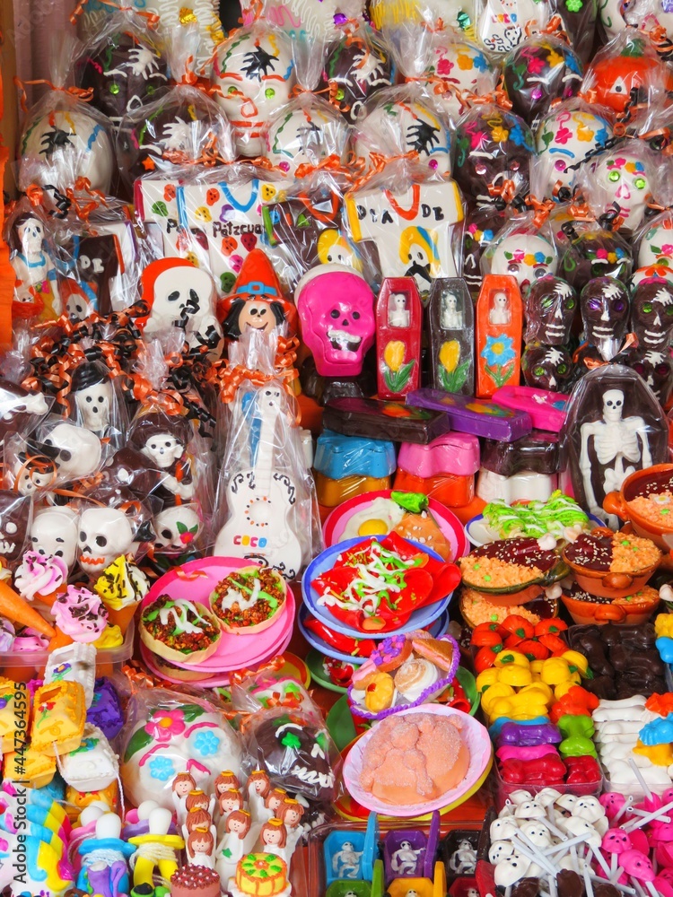 Mexican Day of the dead sugar skulls and figurines
