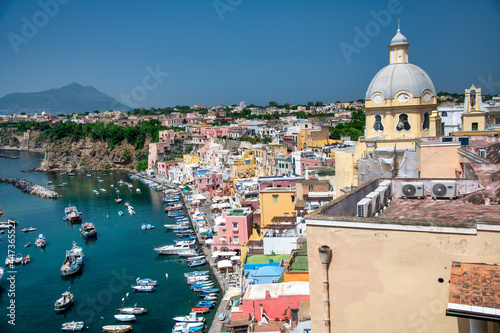 PROCIDA, ITALY - JUNE 22, 2021: Aerial view of La Corricella, colorful homes along the sea.