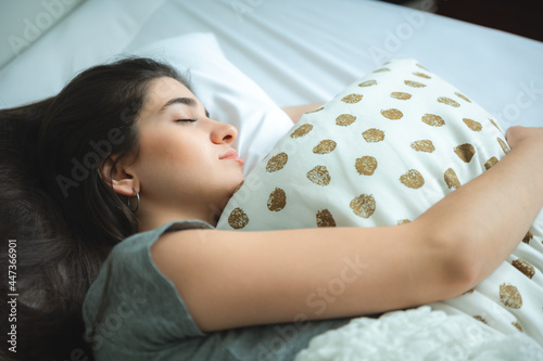 sleepy young woman relaxing...