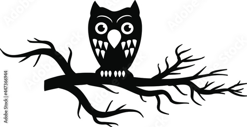 Owl on tree branch for halloween