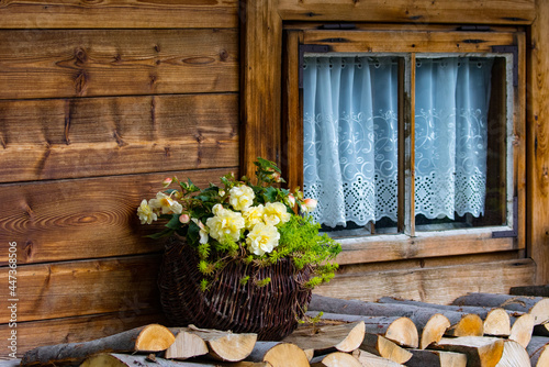 Fototapeta Naklejka Na Ścianę i Meble -  window in a wooden highlander hut, Zakopane, Poland