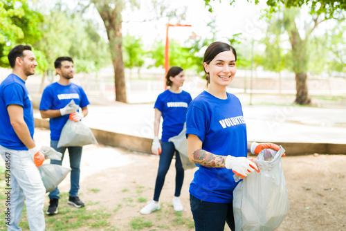 Group of volunteers helping to clean the park © AntonioDiaz