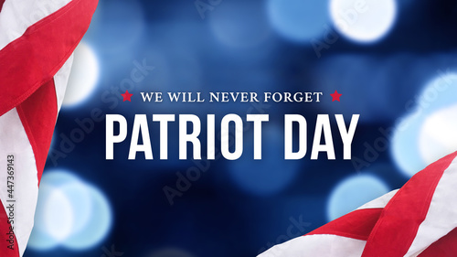 Patriot Day - We Will Never Forget Text Over Blue Bokeh Lights Texture Background and American Flags, 9/11 Remembrance Graphic Design, September 11 Memorial Holiday Banner