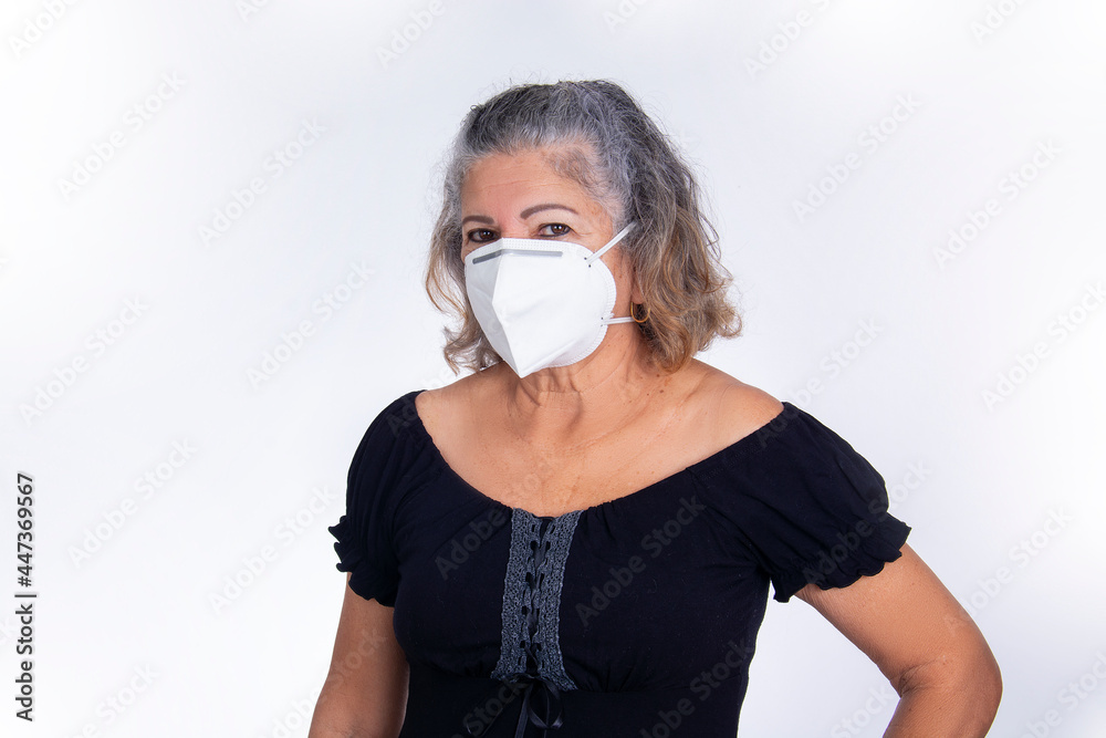 elderly woman wears protective mask covid, flu, health care, personal care, elderly in adaptation care covid-19, new normal elderly woman wears protective mask covid, flu, health care, personal care, elderly in adaptation care covid-19, new normal