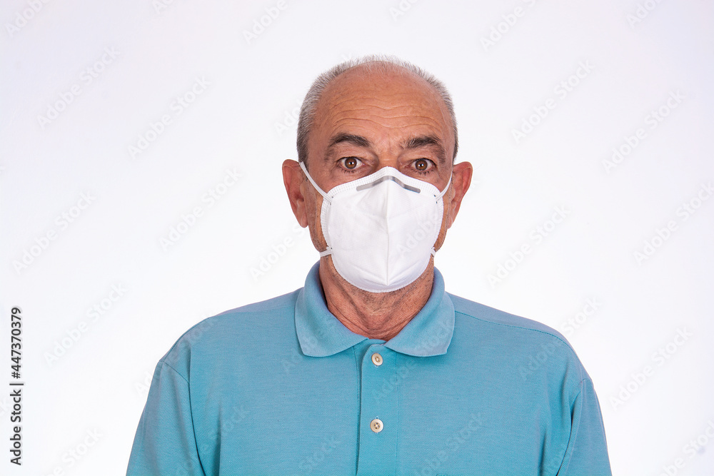 scared elderly man wearing covid protective mask, on white background. scared elderly man wearing covid protective mask, on white background.