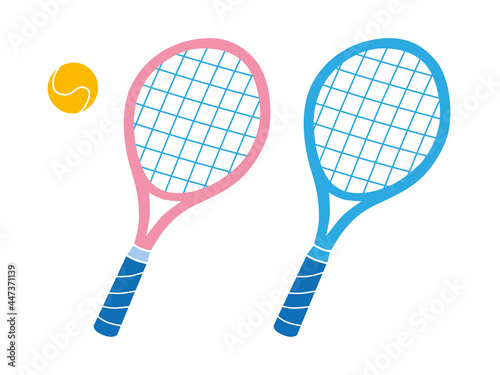 Pink and blue tennis rackets and ball isolated