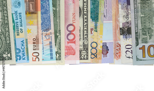 Background from paper Money of the different countries closeup.