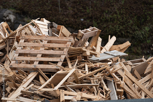 Fototapeta Naklejka Na Ścianę i Meble -  Destroyed wooden pallets at a landfill.