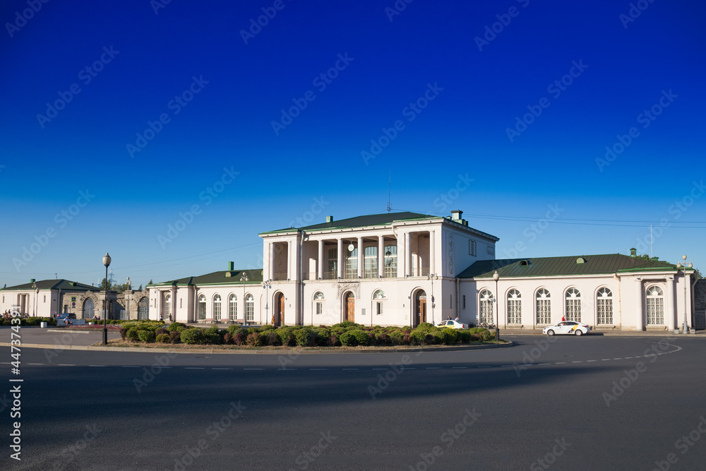 Building of railway station in the city of Pushkin, Tsarskoe Selo. Blue sky, empty street, summertime