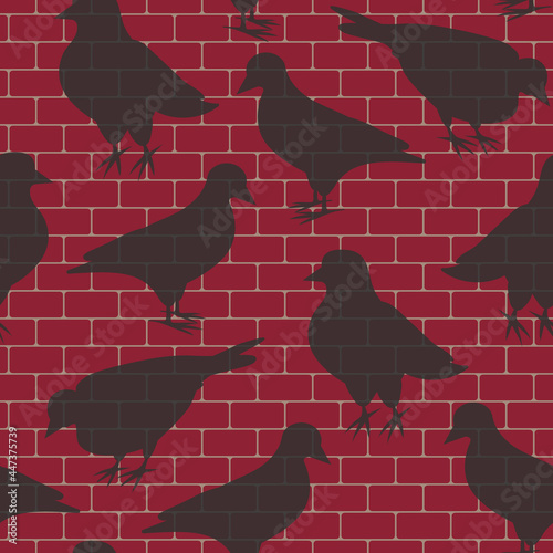 Vector black pigeons on a red brick wall seamless pattern. Ideal for city life and pigeon lovers. Perfect for fabric, wallpaper, scrapbooking and stationery.