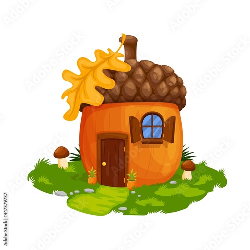 Fairy acorn dwarf or gnome house, dwelling. Vector fairytale home with wooden door, windows with shutters and oak leaf on roof. Cute cartoon fantasy building on green field with grass and mushrooms