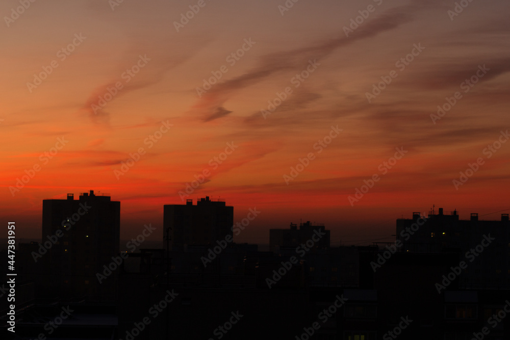 orange sunset in the sky in the city