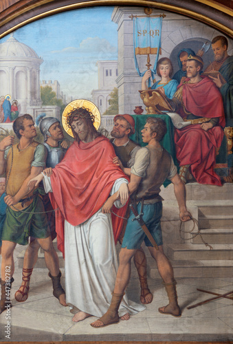 VIENNA, AUSTIRA - JUNI 17, 2021: The painting of Fall of Jesus before Pilate as part of Cross way stations in church Marienkirche by redemptorist Maximilian Schmalzl from end of 19. cent.