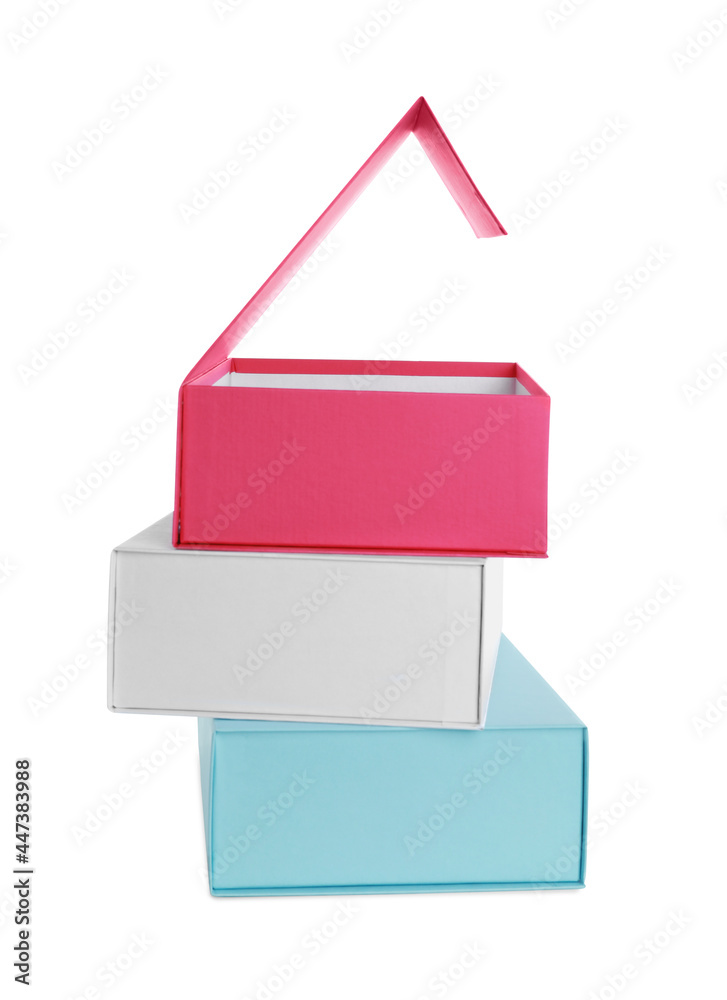 Stack of colorful shoe boxes on white background Stack of colorful shoe boxes on white background